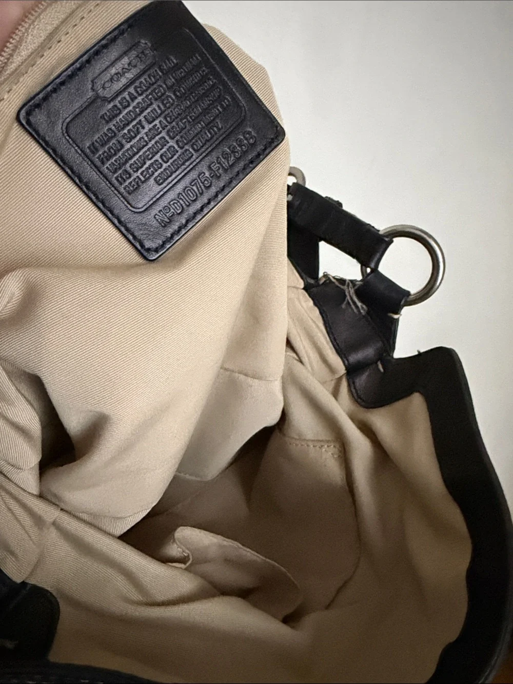 Coach Chelsea hobo shoulder bag crafted from black pebbled leather